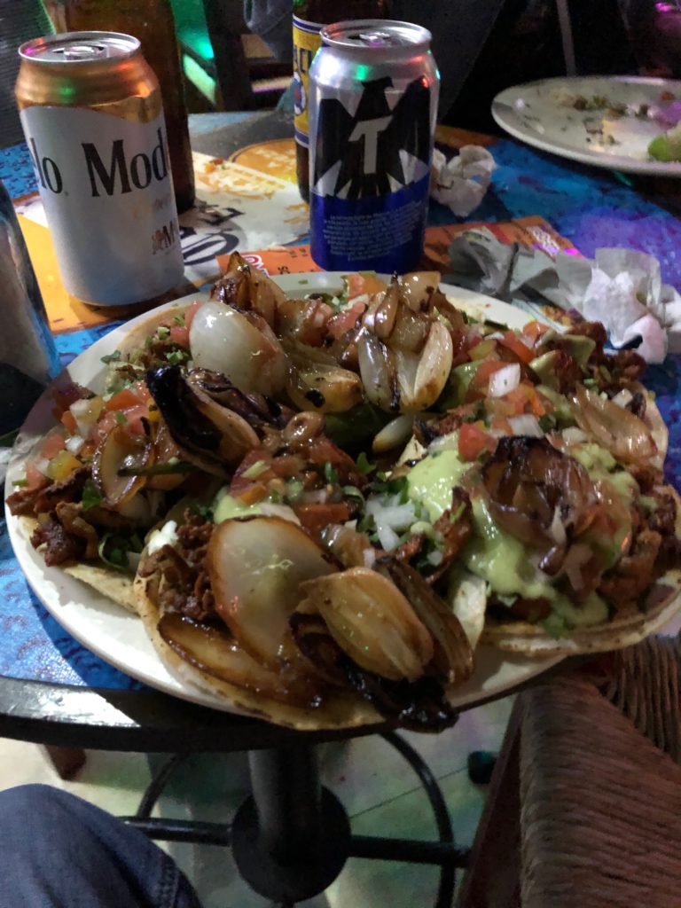 Plate of tacos and beer in Cabo.